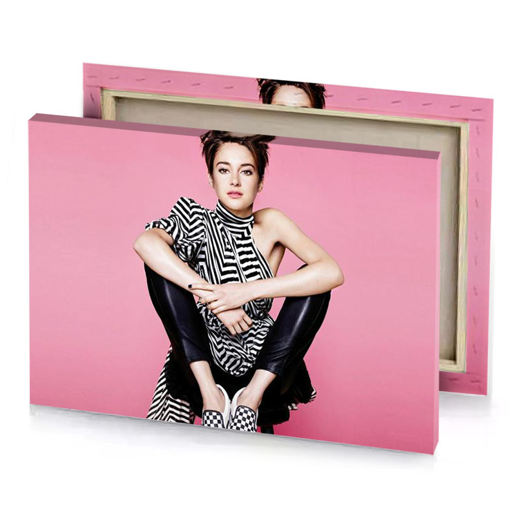 a woman sitting on pink surface smoky black canvas