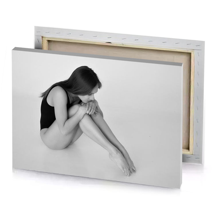 a woman sitting on the floor with her head in manatee canvas