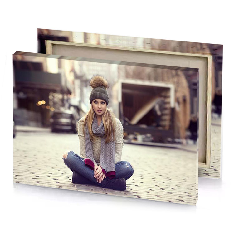 a woman sitting on the ground eggshell canvas