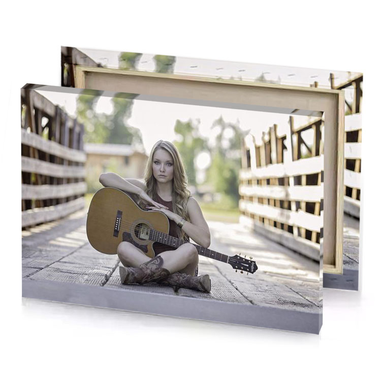 a woman sitting on the ground with guitar dark olive green canvas