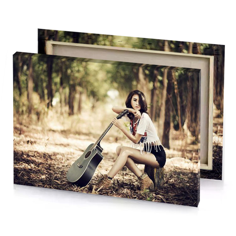 a woman sitting on the ground with guitar pearl canvas