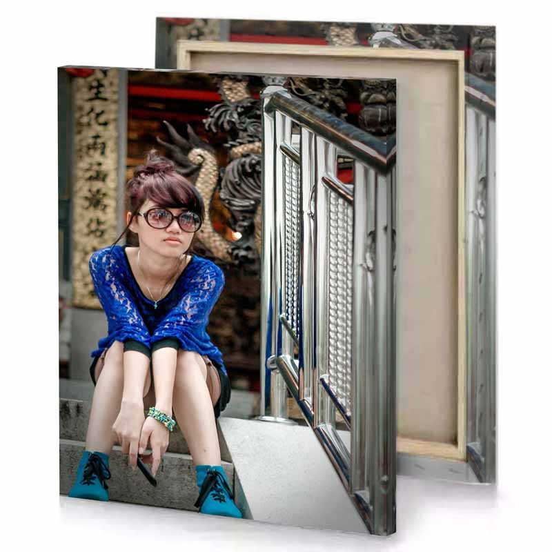 a woman sitting on the steps of building charcoal canvas