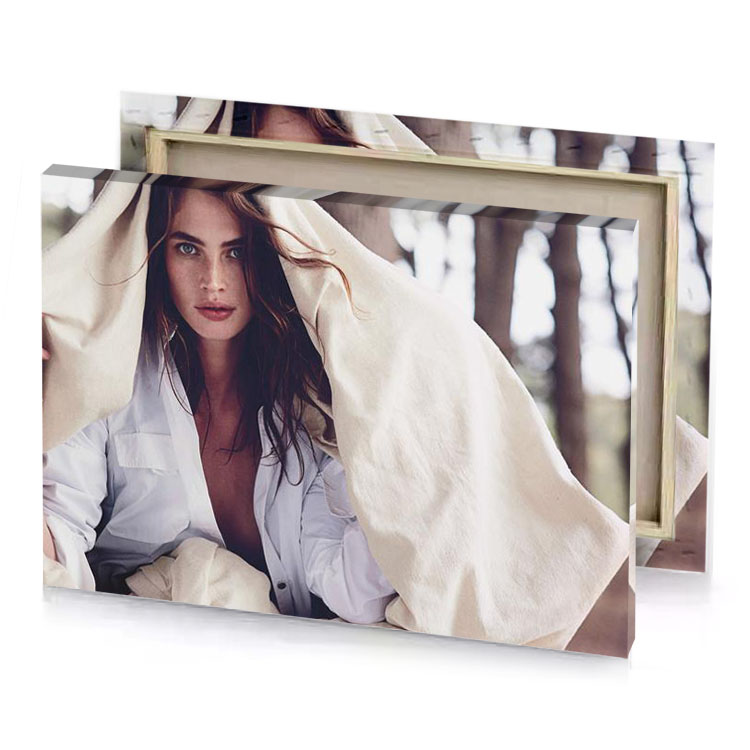 a woman sitting under blanket in the woods silver canvas