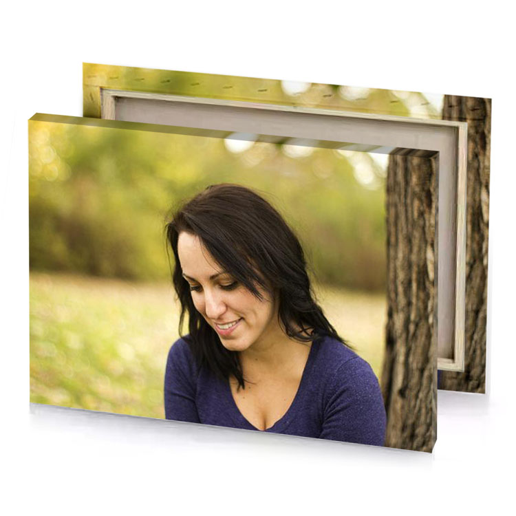 a woman sitting under tree with cell dark khaki canvas