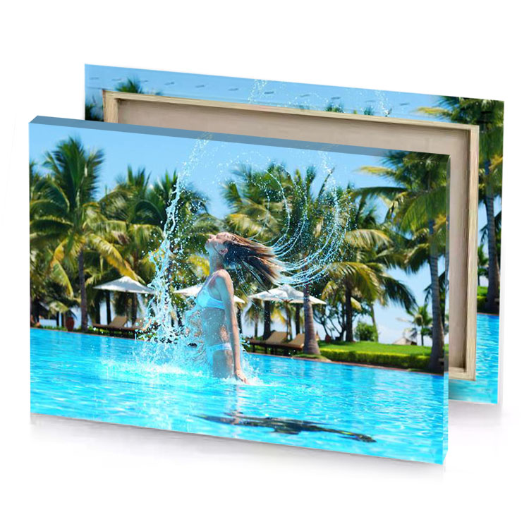 a woman splashing water on her face in pool moonstone blue canvas