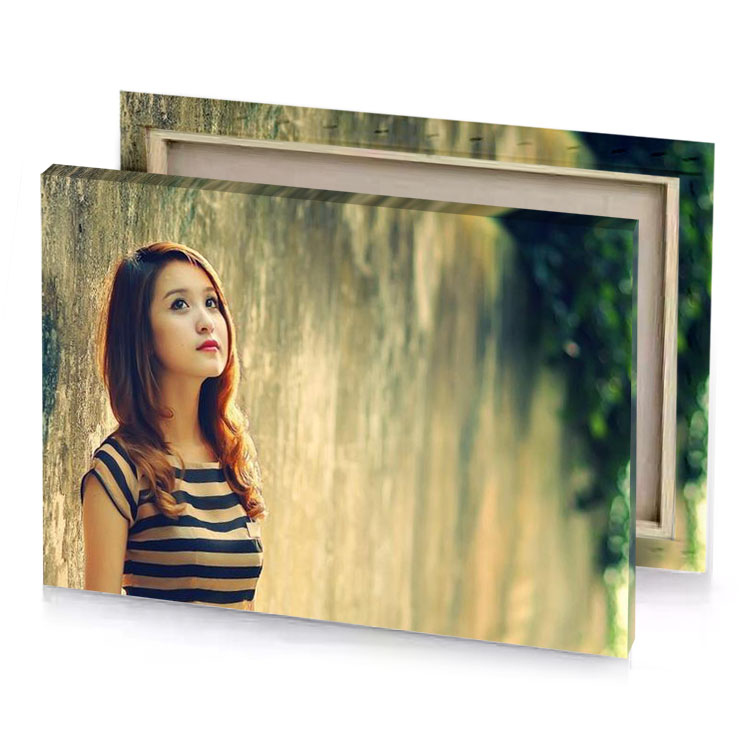 a woman standing against wall tan canvas