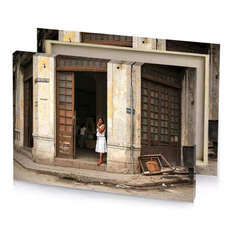 a woman standing in doorway of building champagne canvas