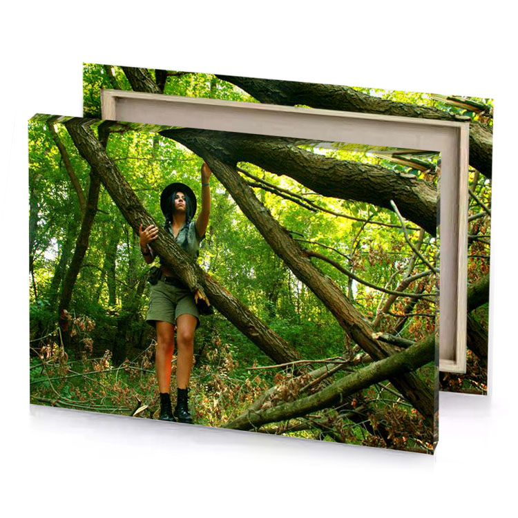 a woman standing in forest with cell olive drab canvas