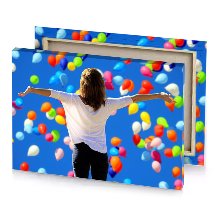 a woman standing in front of bunch balloons tan canvas
