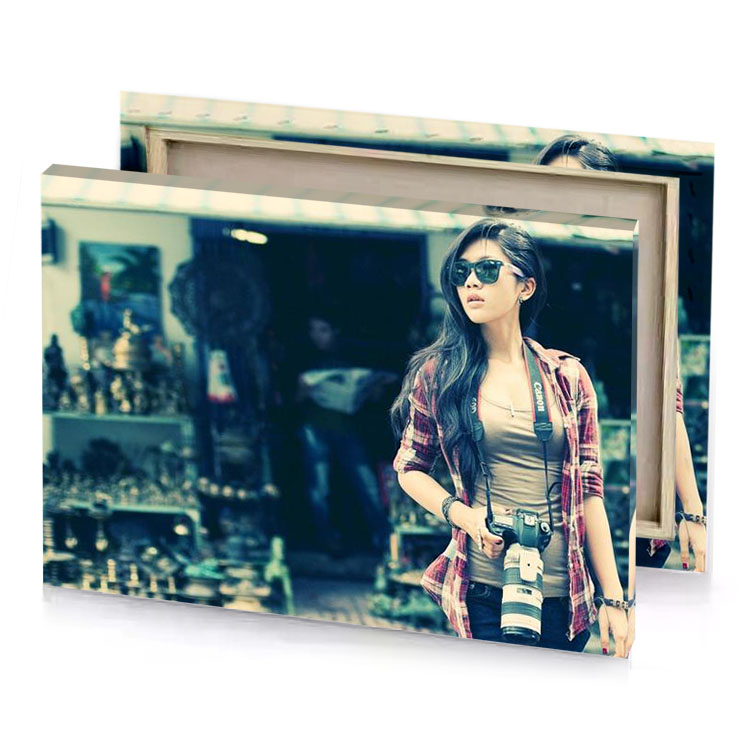 a woman standing in front of store prussian blue canvas