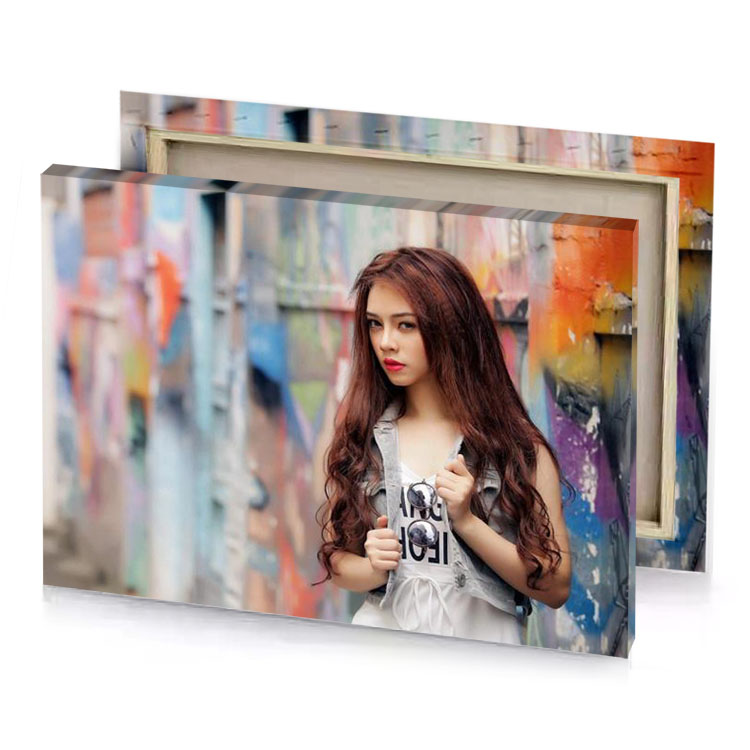 a woman standing in front of wall covered with graffiti silver canvas