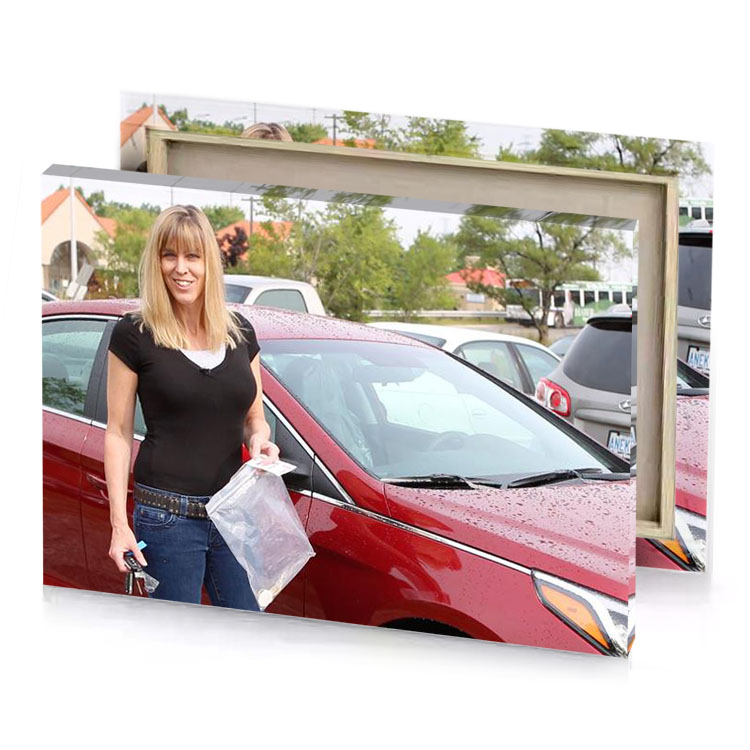 a woman standing next to red car burgundy canvas