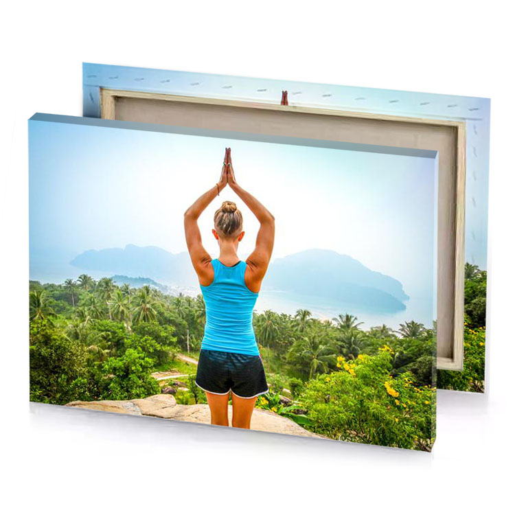 a woman standing on rock with her arms raised turquoise blue canvas