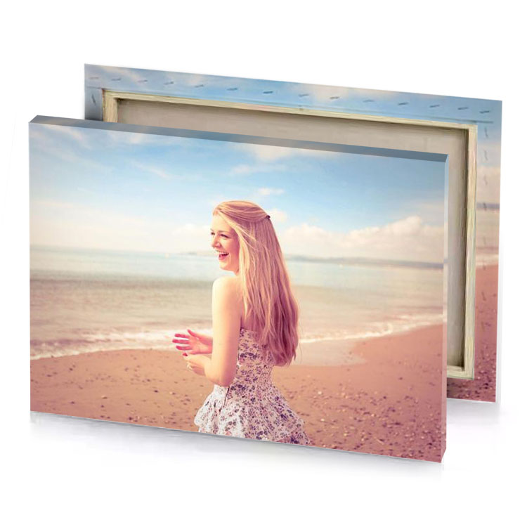 a woman standing on the beach with her hair in platinum canvas