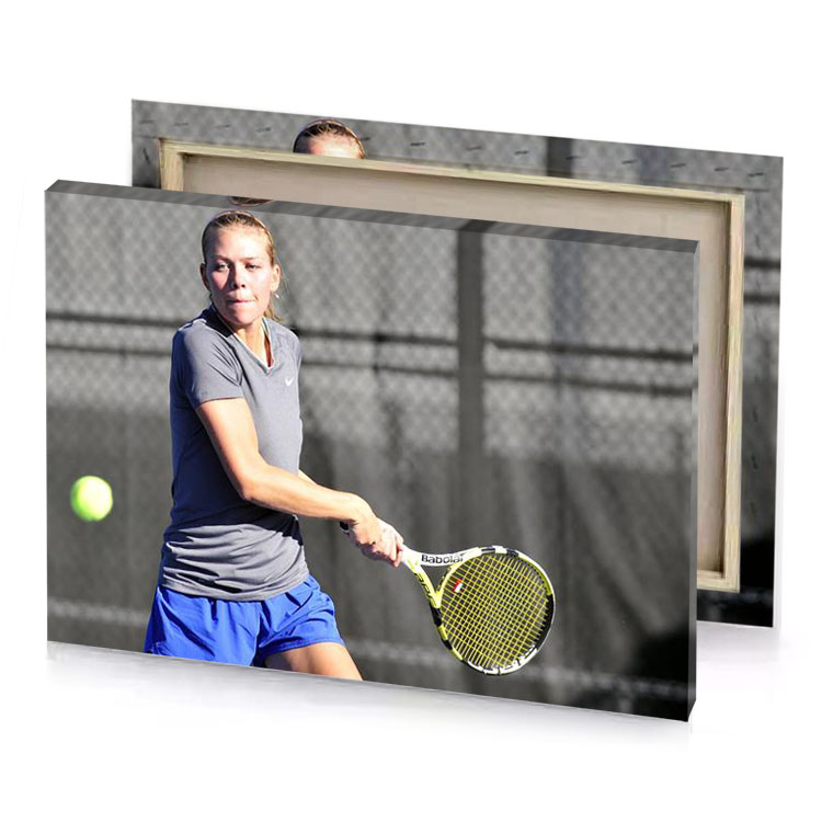 a woman swinging tennis racket at ball dim gray canvas