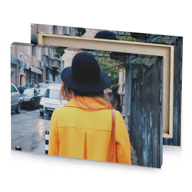 a woman walking down street with hat on dark khaki canvas