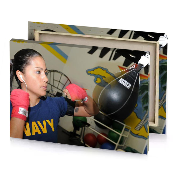a woman wearing boxing gloves and pair of smoky black canvas
