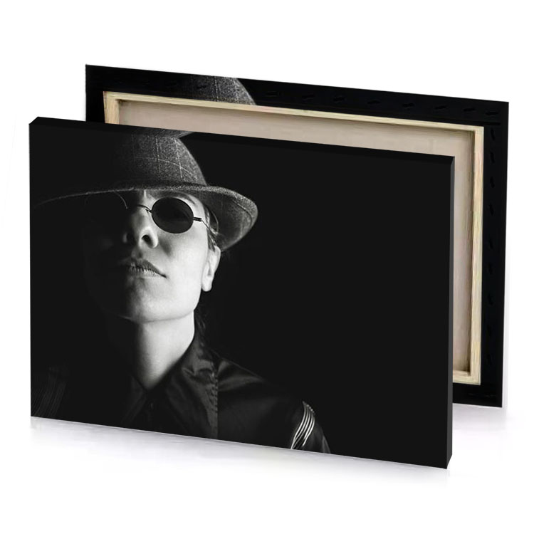 a woman wearing hat and sunglasses platinum canvas