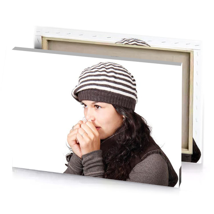 a woman wearing hat and sweater white canvas