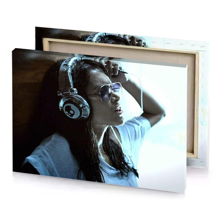 a woman wearing headphones and listening to music smoky black canvas