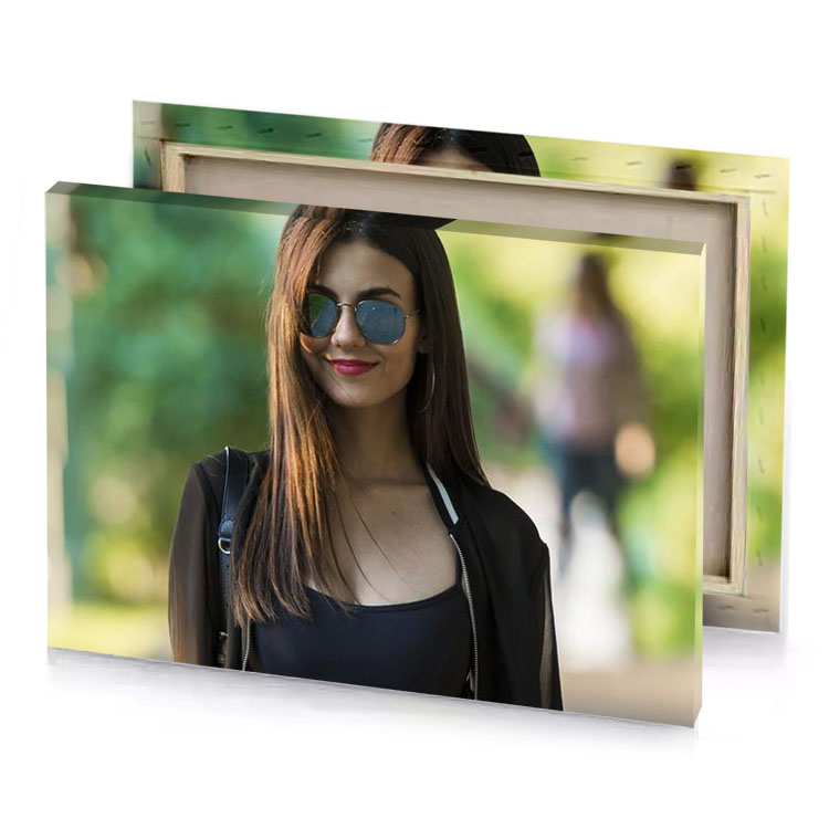 a woman wearing sunglasses and black top dark khaki canvas