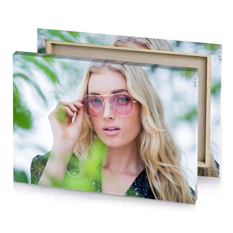 a woman wearing sunglasses and looking at the camera lavender canvas