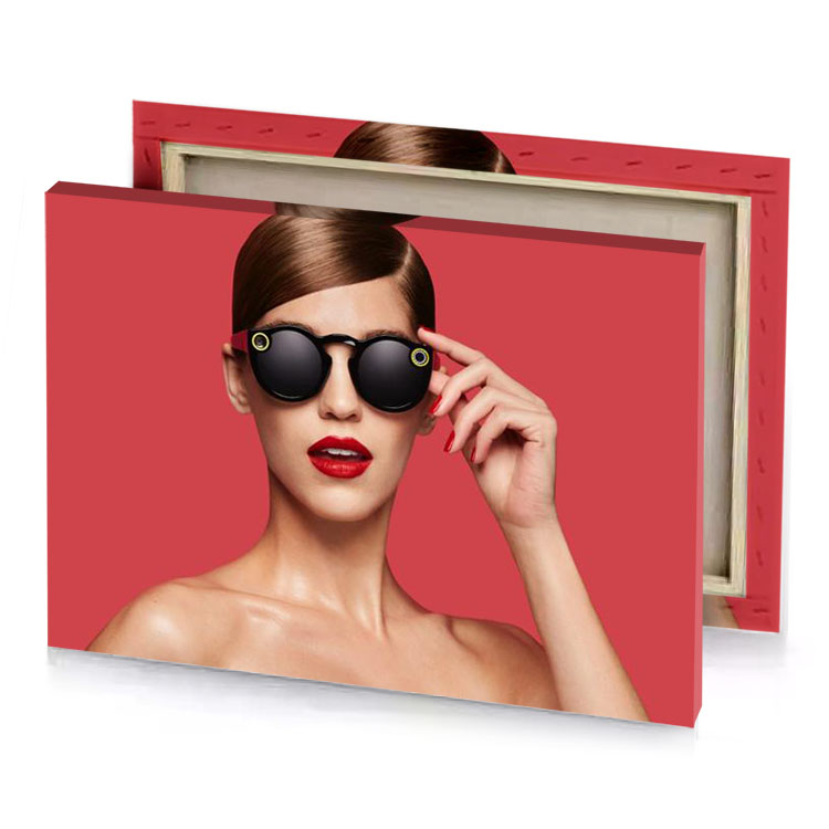 a woman wearing sunglasses with red background zinnwaldite brown canvas