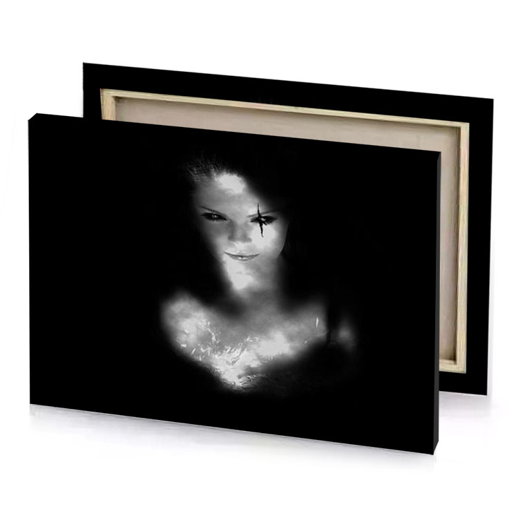 a woman with black and white face in the dark canvas