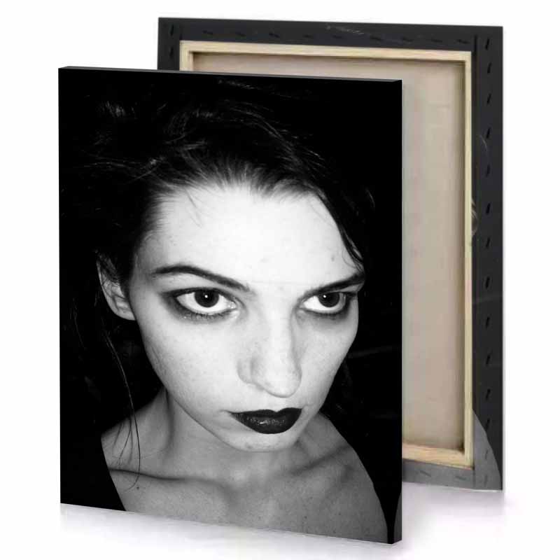 a woman with black lipstick and lip canvas