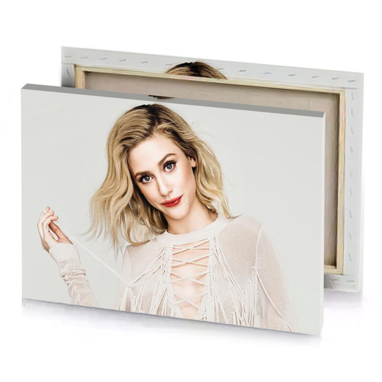 a woman with blonde hair and fringes posing for magazine gainsboro canvas