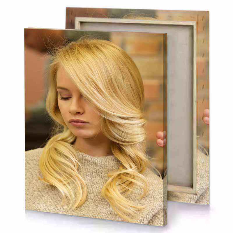 a woman with blonde hair is looking down burlywood canvas