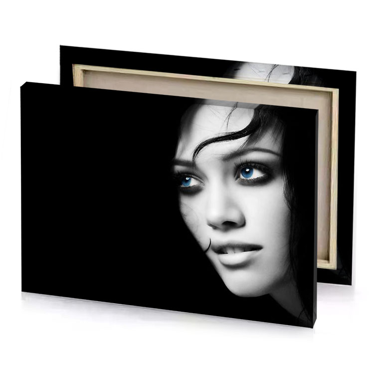 a woman with blue eyes and black hair canvas