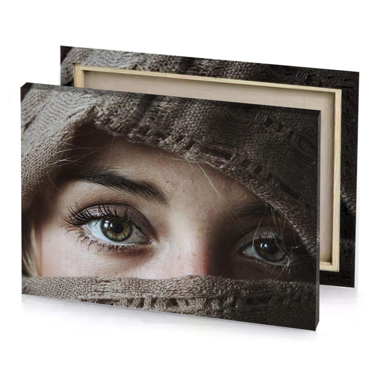 a woman with blue eyes and brown scarf camouflage green canvas