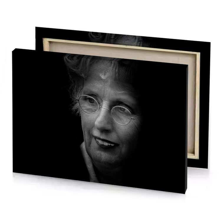 a woman with glasses and black background canvas