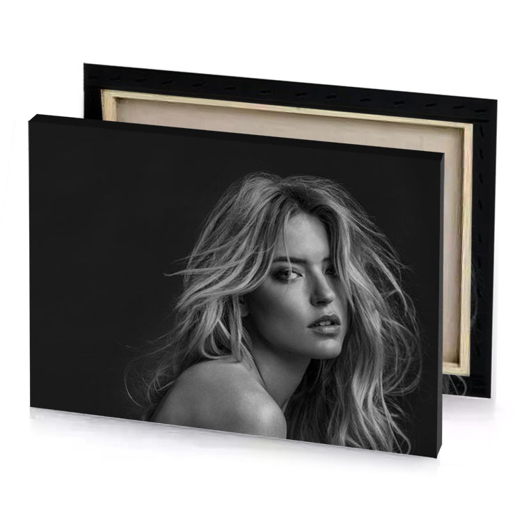 a woman with long blonde hair and black background smoky canvas