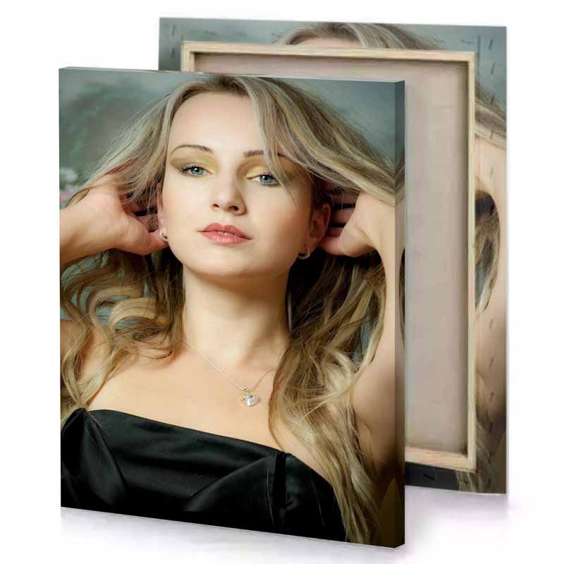 a woman with long blonde hair and black dress tan canvas