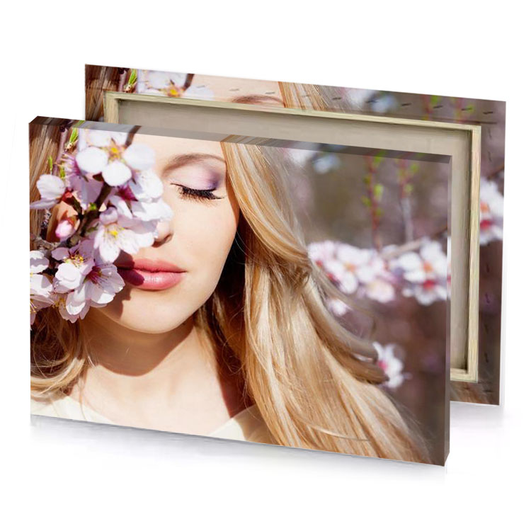 a woman with long blonde hair and pink makeup standing peach canvas