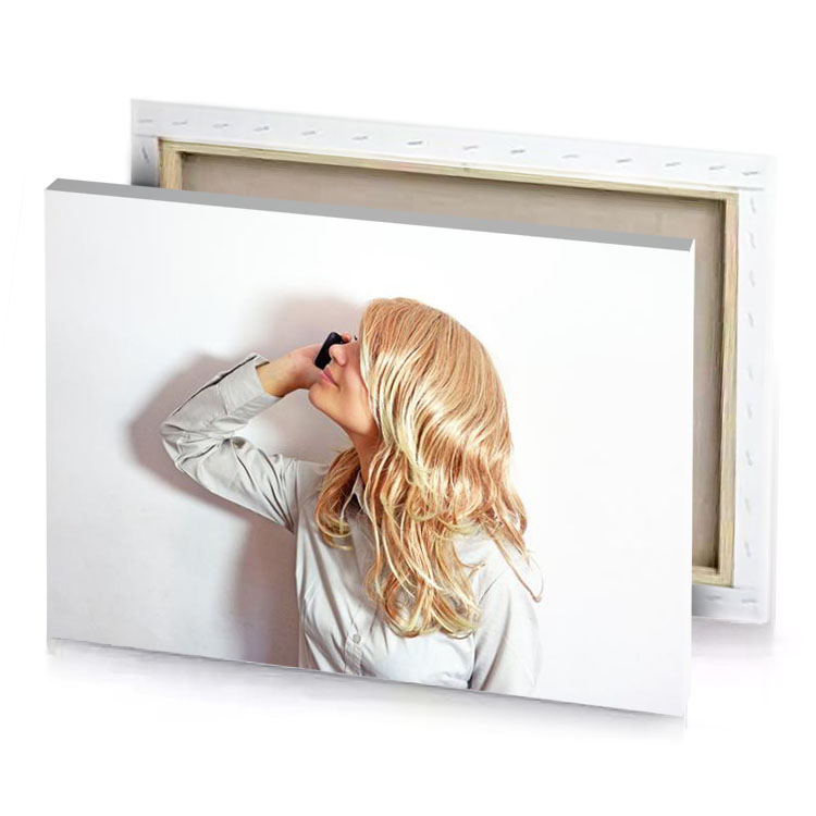 a woman with long blonde hair dark khaki canvas