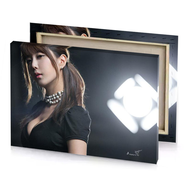 a woman with long hair and black dress taupe canvas