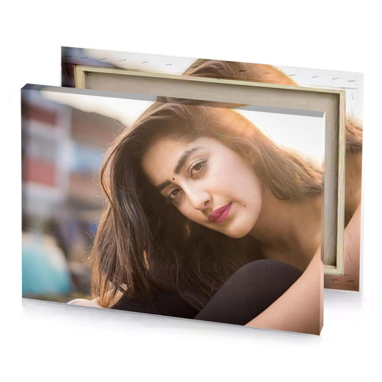 a woman with long hair and black top bistre canvas