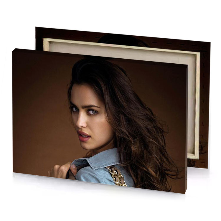 a woman with long hair and blue shirt smoky black canvas