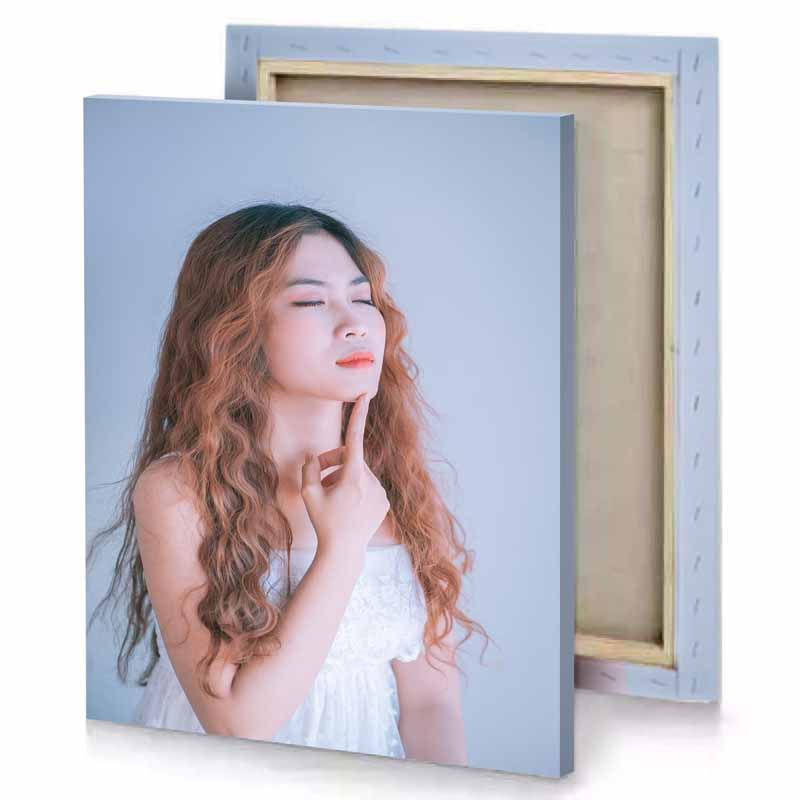a woman with long hair and white dress light steel blue canvas