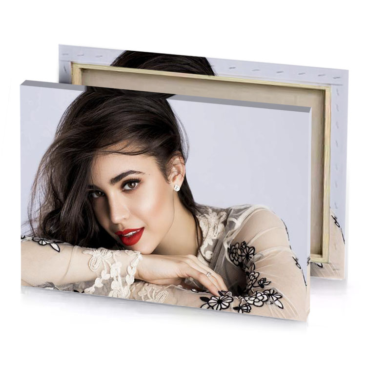 a woman with long hair and white shirt thistle canvas