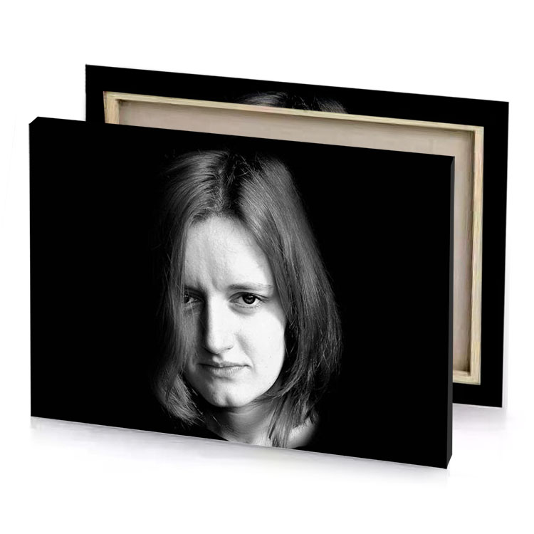 a woman with long hair black canvas