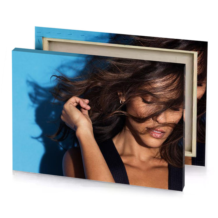 a woman with long hair is posing for picture blue jeans canvas