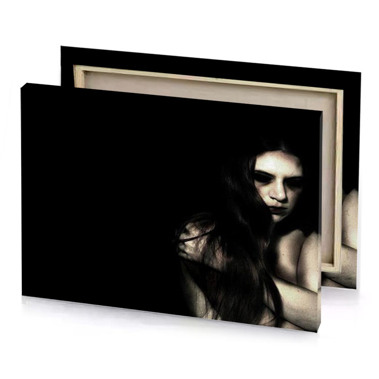 a woman with long hair standing in the dark black canvas