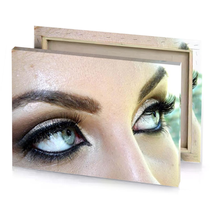 a woman with long lashes and black eyeliner pearl canvas