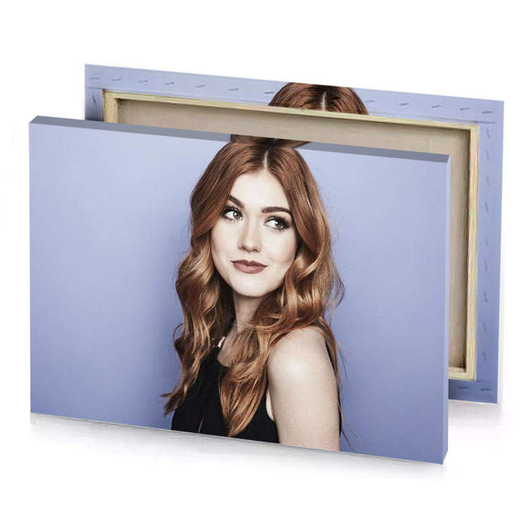 a woman with long red hair and black dress light steel blue canvas