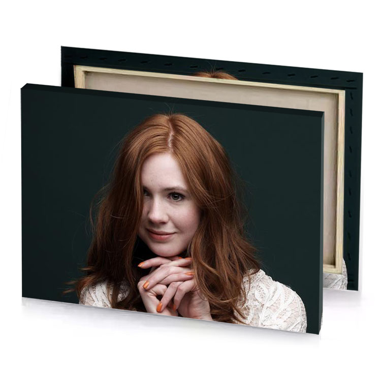 a woman with long red hair smoky black canvas