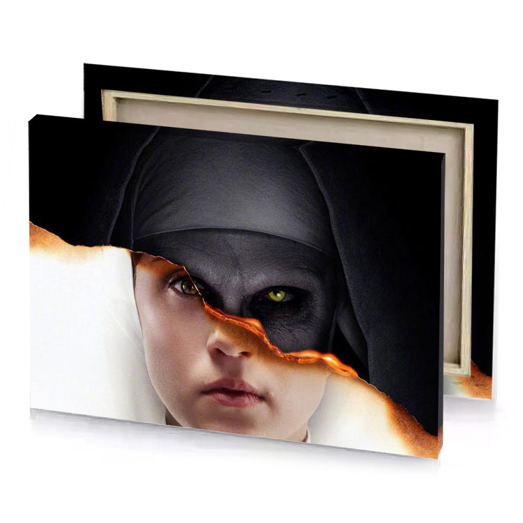 a woman with nun s face behind torn piece of smoky black canvas